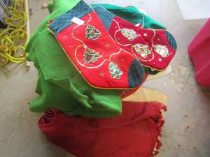 lot 422 image: Tub of Christmas stockings, and tree skirts