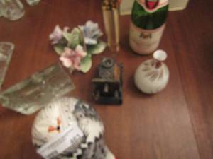lot 463 image: Wine bottle empty, glass roses, porcelain bird, and more
