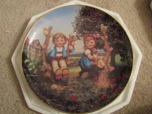 lot 470 image: Set of 12 MJ. Hummel Country crossroads dcor plates, By the Danbury Mint collection, each plate has a different # will be picture   x $$$