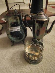 lot 478 image: silver platted lot includes, a pitcher, covered tea kettle and a decorative piece
