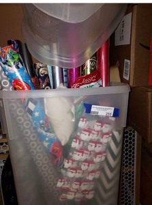 lot 255 image: Plastic tub of used and new Christmas wrapping paper