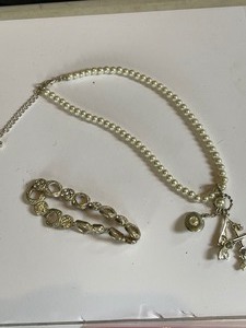 lot 257 image: western inspired pearl necklace and silver bracelet