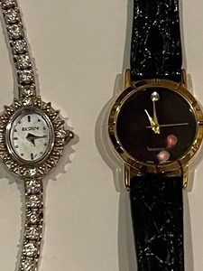 lot 286 image: 2 ladies watches one is Elgin eg124n