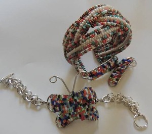 lot 166 image: 2 seed beaded bracelets and matching earrings