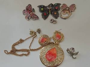 lot 125 image: Coral necklace with matching earrings, 2 butterfly pendants, cross earrings and more