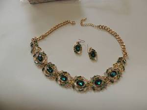 lot 144 image: emerald green and clear faux stone necklace and matching earring set