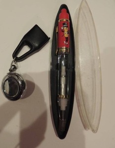 lot 273 image: Mr. Peanut pen and Name tag fob