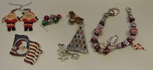 lot 195 image: christmas pins, 3 sets of earrings and charm bracelet