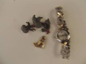 lot 192 image: 2 poodle pins and 1 fashion watch