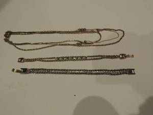 lot 184 image: 1 gold necklace and 2 faux stone bracelets
