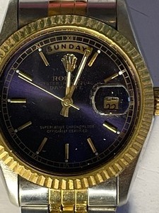 lot 10 image: Rolex Oyster perpetual day date wt. 62 grams gold silver with purple face Authenticity unverified