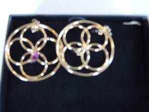 lot 222 image: All new in box Avon jewlery- gold earrings, Beautiful silver heart solid fragrance holder and southwestern drop necklace and earring set