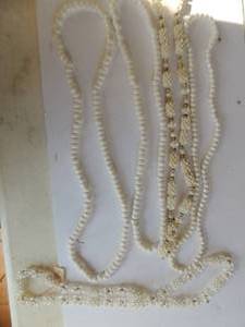 lot 52 image: Six quality white assorted necklaces