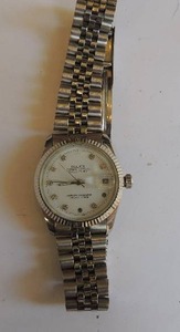lot 48 image: Rolex Oyster Perpetual Date adjust wt. 88 gms Silver  Authenticity Unverified