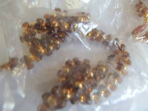 lot 55 image: Necklaces plastic assured colors clear which is not a color I know, blue, gold, multicolor etc.