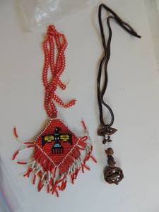 lot 53 image: Beaded necklace with native American eagle and wood, sliced shell necklace with leather