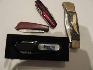 lot 69 image: Pocket knife x 4