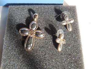 lot 66 image: Lia Sophia cross with matching earrings