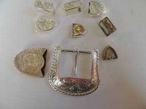 lot 67 image: Belt Buckle and tip 3 and 3 belt tip and loop sets