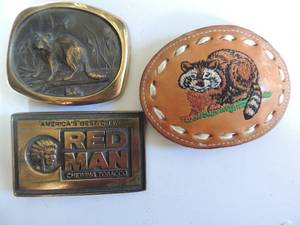 lot 74 image: Leather Raccoon belt buckle