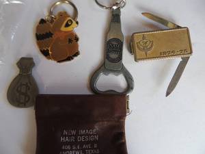 lot 71 image: Two each money clips and key chains