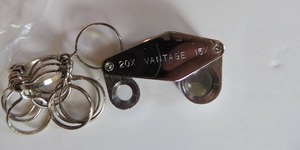 lot 93 image: Jewelers loop and ring sizer