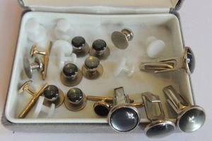 lot 62 image: Tux buttons and cufflinks