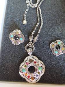 lot 63 image: Lia Sophia silver necklace and earrings