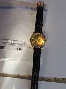 lot 19 image: Genve watch with black leather band