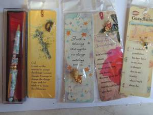 lot 8 image: Four bookmarks with pins NEW and writing pen