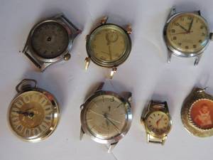 lot 308 image: 5 vintage watch faces and 1 womans blouse or pocket watch