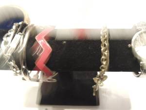 lot 259 image: 1 fashion watch 1 cross key chain and 5 bracelets