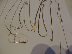 lot 224 image: 6 chains one with a cross and one chain bracelets