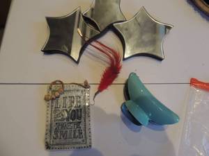 lot 244 image: life with you makes me smile  red feather earring, 3 joined mirror stars