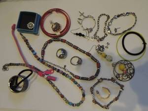 lot 245 image: 2 stone necklaces, 7 bracelets, 2 rings size 7, assorted mismatched earrings and 3 hair ties