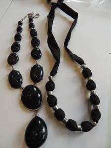 lot 221 image: 2 black and silver necklaces