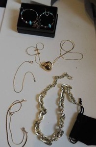 lot 223 image: 3 gold chain bracelets, western inspired hoop earrings, gold heart lasso necklace and heavy costume chain necklace