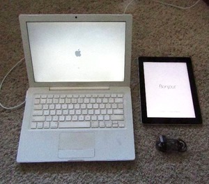 lot 112 image: Apple ipad 2nd generation model A1395 and 2007 Apple macbook model A1181 (no charge cord)