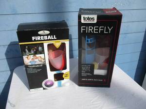 lot 102 image: 2-Displays-FireFly DayNight Ball Toss Game With Glow In The Dark Ball And LED Base In The Catcher For Night Play, Note 2 x Money