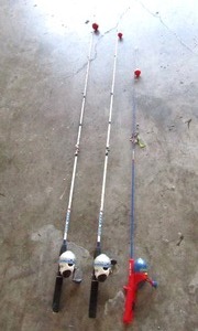 lot 158 image: Star wars fishing poles (2) and Spider man kids fishing pole, all with reels