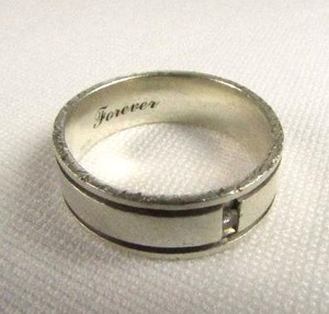 lot 169 image: .925 Silver ring with single genuine diamond chip setting