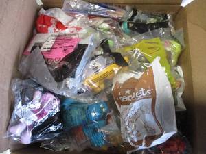 lot 50 image: FULL BOX OF MIXED TYPES AND DATES- UNOPENED Packages Of McDonalds Kids Meal Toys, About 12 x 12 x 6-H