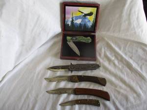 lot 63 image: 5-Pocket Knifes-1-UTICA-IBEW 100-Yr. Anniversary,1-SCHRADE-187,1-MAXAM Allie Cat,1-DARK SIDE BLADES,1-Eagle In Box
