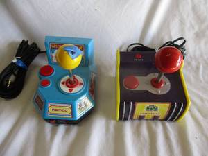 lot 72 image: 2-NAMCO-Plug And Play- TV Games, 1- 5-in-1 Pac Man Dig Dug, 2003 Jakks Pacific And1-1-5-in-1 Ms Pac Man 2003 Jakks Pacific