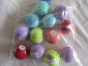 lot 109 image: 12-Italia Deluxe- Sweet Flavor Globe Lip Balm With Mineral Oil-Mixed Flavors-Loose Globes In Bag.  Note 12 x Money