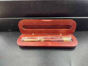 lot 98 image: Ink pen with wood display case