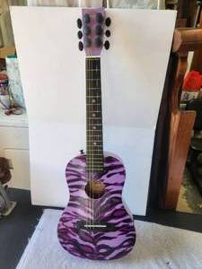 lot 153 image: First Act Discovery Guitar - missing string