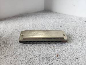 lot 186 image: Vintage Super Scout Magnus Harmonica