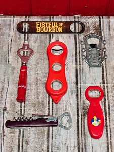 lot 107 image: Six Vintage Bottle Openers