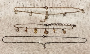lot 129 image: Three Vintage Chains W Pendants